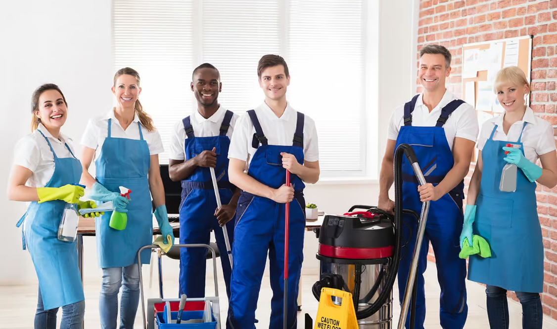 A professional cleaner equipped with cleaning supplies, covered under comprehensive cleaning service insurance by Insurance Company Grove City, ensuring protection and peace of mind for service providers.