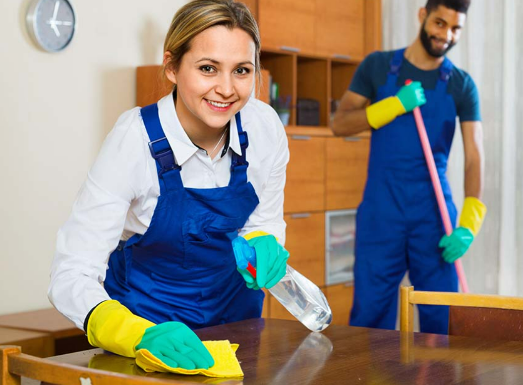 a professional house cleaning team with cleaning supplies, representing comprehensive business insurance coverage offered by Insurance Company Grove City for house cleaning services, ensuring protection and peace of mind.